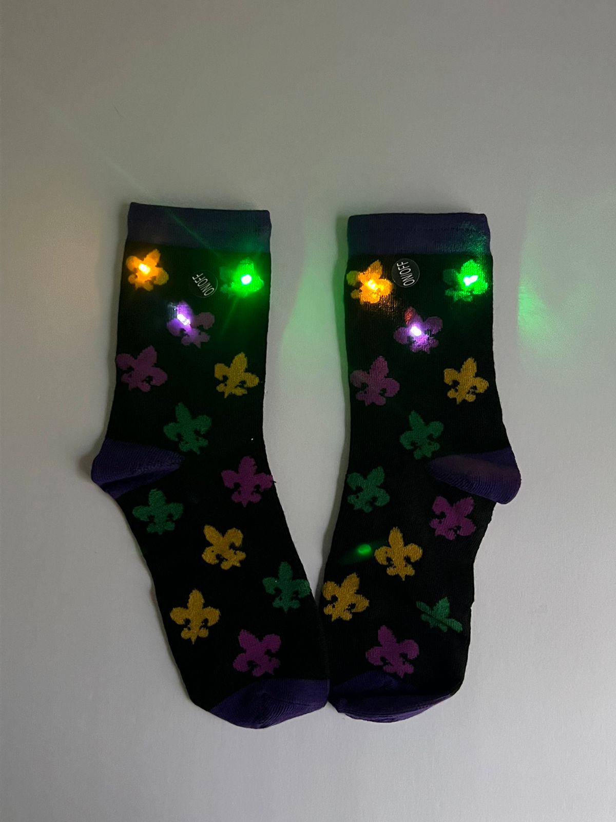 Shine Bright with Our Light-Up Mardi Gras Socks!